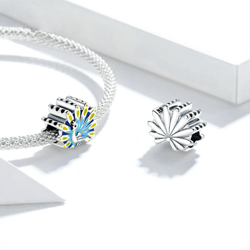 Perla di fascino smaltato blu pavone in argento sterling