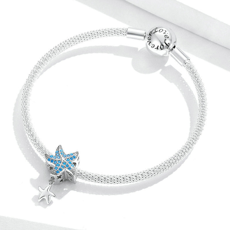 Perla di fascino stella marina blu giocosa in argento sterling