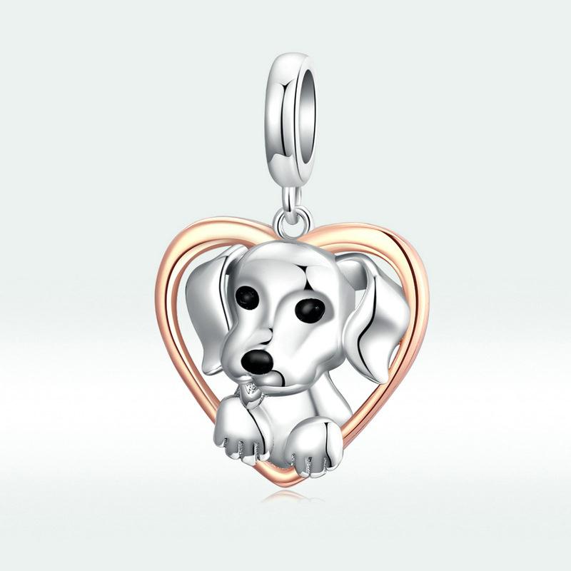 Simpatico ciondolo in argento sterling a forma di cuore con cucciolo