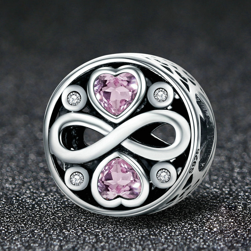 Perla rotonda in argento sterling con cuore rosa