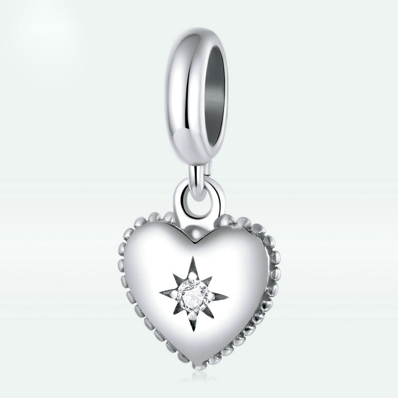 Ciondolo a forma di cuore in argento sterling con stella scintillante