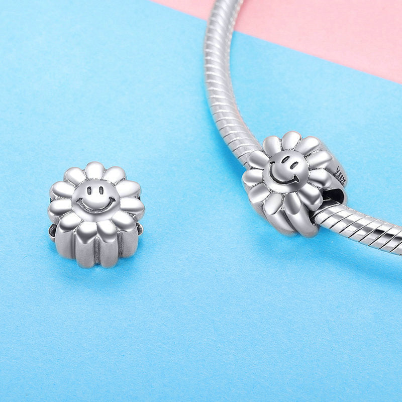 Perle en argent sterling avec visage souriant et fleur du soleil